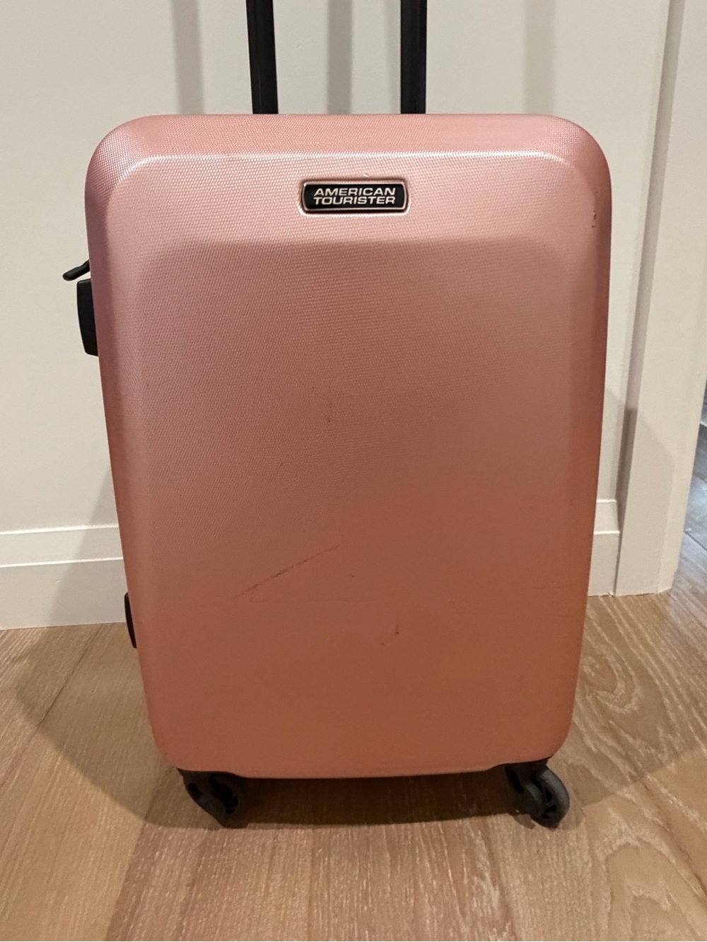American Tourister Pink Hard-Shell Carry-On Spinner